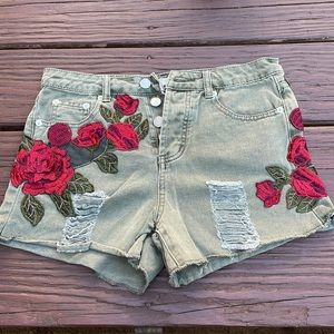 Army green shorts with rose patches